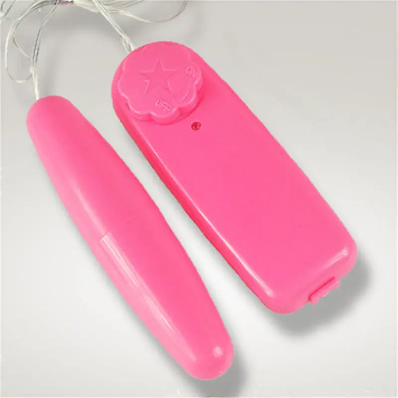 Pink wired remote control and bullet vibrator sex toy on white background