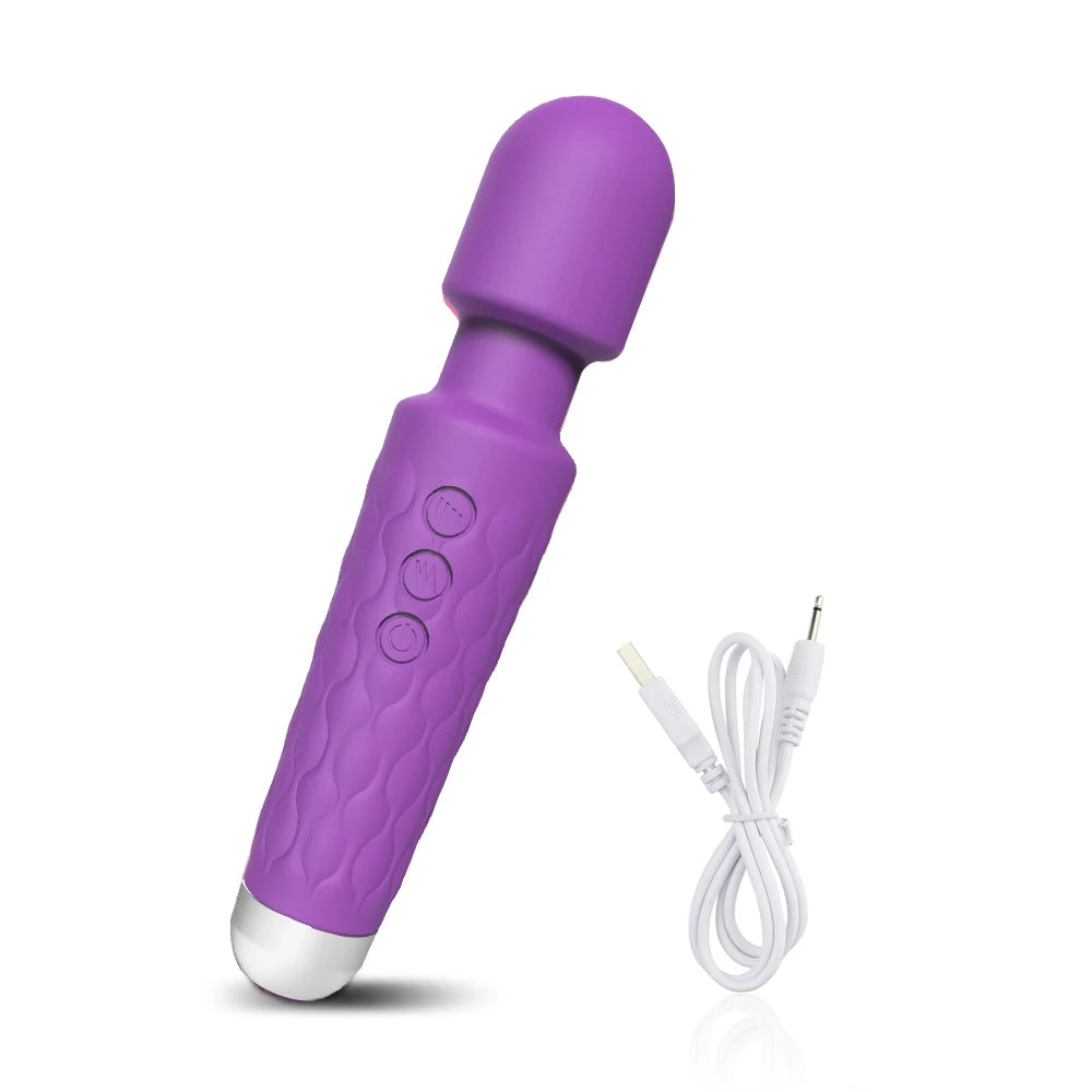 Purple handheld massager with textured grip and three control buttons, plus white charging cable