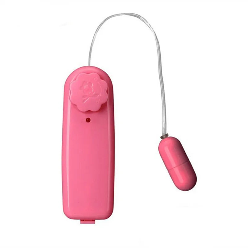 Pink wireless remote-controlled vibrating egg with floral dial and LED indicator